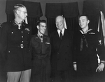 US President Dwight Eisenhower with Medal of Honor recipients Edward Schowalter, Jr., Ernest West, and William Charette, White House, Washington DC, United States, 12 Jan 1954