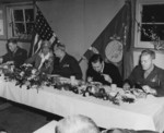 Eleanor Roosevelt and Major General Julian Smith at a dinner with US 2nd Marine Division officers, New Zealand, Aug-Sep 1943