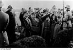 Frick and others saluting during a ceremony in Sudetenland, Czechoslovakia, 23 Sep 1938