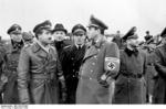German leaders Albert Speer and Adolf Galland at a conference, possibly reviewing a new aircraft, Germany, 5-7 Sep 1943