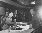 Yasuji Okamura surrendering to He Yingqin, Nanjing, China, 9 Sep 1945, photo 3 of 3
