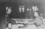Yasuji Okamura surrendering to He Yingqin, Nanjing, China, 9 Sep 1945, photo 1 of 3