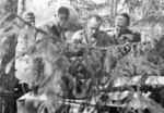 Finnish Army Lieutenant General Erik Heindrichs, Colonel Ruben Lagus, and Major General Paavo Talvela in discussion in the field, summer 1941