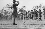 Major General Edmund Herring inspecting troops of Australian 6th Division, Darwin, Australia, 1942