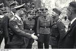 Heinrich Himmler meeting a man at the rank of SS-Obersturmführer, Mauthausen Concentration Camp, Austria, 27 Apr 1941