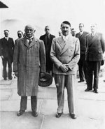 Former British Prime Minister David Lloyd George and German leader Adolf Hitler at Obersalzberg, Berchtesgaden, Bavaria, Germany, 7 Jun 1936; note Ribbentrop in background center