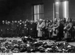 German leaders at Berlin Heroes Memorial, Germany, 25 Feb 1934; L to R: Neurath, Graf Schwerin-Krosigk, Lippert, Frick, Schmidt, Raeder, Hitler, Papen, Goebbels, Hindenburg, Göring, Blomberg, Fritsch