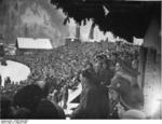 Chancellor Hitler speaking at the opening ceremony of IV Olympic Winter Games, Garmisch-Partenkirchen, Bavaria, Germany, 6 Feb 1936; note Heß behind Hitler