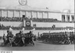 Adolf Hitler reviewing a Reich Labor Service (RAD) parade, Zeppelin Field, Nürnberg, Germany, Sep 1937