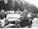 Mussolini and Hitler in an open-top Mercedes-Benz limousine, Berlin, Germany, late Sep 1937