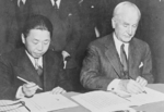 Chinese Ambassador Wei Daoming and US Secretary of State Cordell Hull signing the Treaty for Relinquishment of Extraterritorial Rights in China, Washington DC, United States, 11 Jan 1943