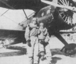 Chinese pilots Jiang Xianxiang (left) and Luo Yingde (right) with a Hawk II (F11C Goshawk) fighter, China, 1930s