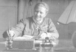 Fanni Luukkonen working at her desk, 1940s