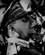 Profile of MacArthur shortly after fulfilling his promise to return, Tacloban, Leyte, Philippines, 23 Oct 1944. Note Sergio Osmeña behind MacArthur.