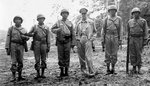 Douglas MacArthur with Native American troops somewhere in the South Pacific, late 1943