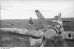 Hans-Joachim Marseille with a British Hurricane fighter that he had shot down, Libya, Mar 1942, photo 2 of 3