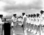 Doris Miller receiving the Navy Cross award from Admiral Chester Nimitz, onboard carrier Enterprise, Pearl Harbor, US Territory of Hawaii, 27 May 1942; photo 1 of 2
