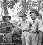 Australian Lt Col Mervyn Jeanes, US Gen Douglas MacArthur, and Australian Lt Gen Leslie Morshead inspecting positions held by Jeanes