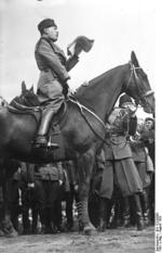 Benito Mussolini atop a horse in the Dolomites mountains in northeastern Italy, Aug 1929