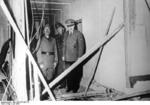 Adolf Hitler showing Benito Mussolini the wreckage after the unsuccessful assassination attempt on Adolf Hitler, Wolfsschanze, Rastenburg, Germany, late Jul 1944, photo 2 of 2