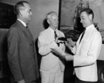 Rear Admiral Chester Nimitz being sworn in as US Navy Chief of the Bureau of Navigation by Rear Admiral Walter Woodson at the Navy Department, Washington DC, United States, Jun 1939