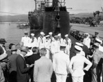 Nimitz having just presented Navy Cross award to Ensign Fisler aboard USS Grayling, Pearl Harbor, US Territory of Hawaii, 31 Dec 1941; Admiral Kimmel at right