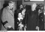 Chancellor of Germany Papen and poet Gerhart Hauptmann with 11-year-old violinist Ruggiero Ricci after she had just performed in a concert in Berlin, Germany, Sep 1932
