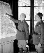 Lord Gort and Lieutenant General Pownall study a map at GHQ in the Chateau at Harbarcq, France, 26 Nov 1939