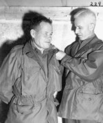 Lewis Puller being promoted to the rank of brigadier general by General Oliver Smith, 26 Jan 1951