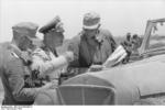 Rommel studying a map with officers, North Africa, 1942