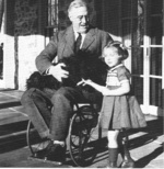 US President Roosevelt in wheel chair with dog Fala and Ruthie Bie (granddaughter of the Hyde Park caretaker), Hill Top Cottage, Hyde Park, New York, United States, Feb 1941