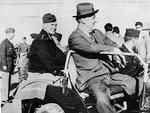 Franklin Roosevelt with Dwight Eisenhower at Castelvetrano Airport in Sicily, Italy, after the conferences at Tehran and Cairo, 8 Dec 1943; note Patton in background