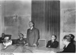 Alfred Rosenberg speaking at a press conference regarding his appointment to the eastern territories, 19 Nov 1941; also present were Gauleiter Alfred Meyer and state press chief Wilhelm Weiss