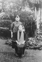 Song Qingling (seated) and Song Meiling (standing), circa late 1910s or early 1920s