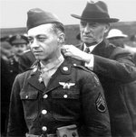 US Secretary of War Henry Stimson awarding the first Medal of Honor to be awarded to an enlisted personnel to Staff Sergeant Maynard H. Smith, Station 111, Bedfordshire, England, United Kingdom, mid-1943, photo 1 of 2