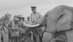 Sun Li-jen off duty with children and an elephant, date unknown