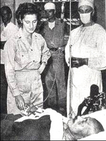 Hideki Tojo being treated by Americans at SCAP hospital in Tokyo, Japan after his failed suicide attempt, 11 Sep 1945