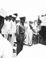 Commander Arnold True, commanding officer of USS Hammann during Battle of Midway, receiving Navy Cross award from William Halsey, Oct 1942