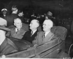 US President Harry Truman, Secretary of State James Byrnes, and Ambassador to Belgium Charles Sawyer in a car, Antwerp, Belgium, 15 Jul 1945, photo 1 of 2