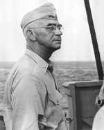 Rear Admiral Richmond Turner aboard USS Rocky Mount off Kwajalein, Marshall Islands, 18 Feb 1944