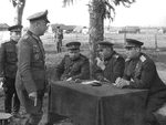 Soviet generals Aleksandr Vasilevsky and Ivan Chernyakhovsky speaking with surrendered German Major General Alfons Hitter, Vitebsk, Byelorussia, 28 Jun 1944