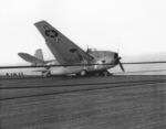 Damaged TBF Avenger aboard USS Coral Sea, 14 Oct 1943; it had crashed into a line of TBF aircraft during landing three days prior