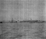 USS Anzio at anchor in the Huangpu River, Shanghai, China, Dec 1945