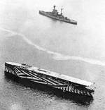 Argus in camouflage, circa late 1918, photo 2 of 3 (R-class battleship sailed near by)
