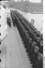 Commissioning ceremony of German battleship Bismarck, 24 Aug 1940, photo 04 of 10; Captain Ernst Lindemann reviewing crew