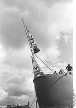 German Navy ensign flying on the stern of battleship Bismarck, 1940-1941