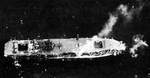 Aerial photo of Chuyo while dead in the water after torpedo hit, morning of 4 Dec 1943; note collapsed forward flight deck
