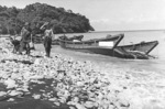 Two wrecked Japanese Daihatsu-class landing craft at Scarlet Beach, Finschhafen, New Guinea, 17 Oct 1943, photo 1 of 2