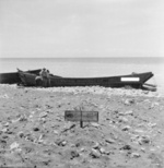 Two wrecked Japanese Daihatsu-class landing craft at Scarlet Beach, Finschhafen, New Guinea, 17 Oct 1943, photo 2 of 2
