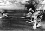 British cruisers Dorsetshire and Cornwall burning during the Indian Ocean Raid, 5 Apr 1942; photo taken from a Japanese aircraft